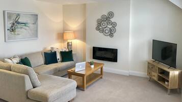 Apartment, 2 Bedrooms | Living area | Flat-screen TV