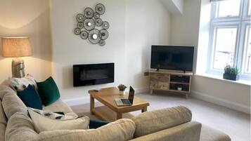 Apartment, 2 Bedrooms | Living area | Flat-screen TV