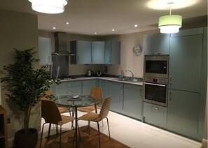 Apartment, 2 Bedrooms | Private kitchen | Full-size fridge, dishwasher, electric kettle, cookware/dishes/utensils - The Old Dairy Apartment (Kidlington)