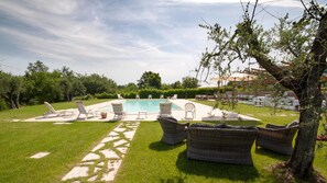 Outdoor pool, pool umbrellas, pool loungers