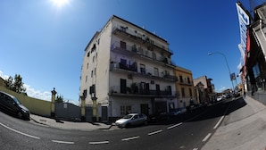 A multi-story building with a ground-floor shop named "HAROLD'S". - The Last Floor (Torre del Greco)