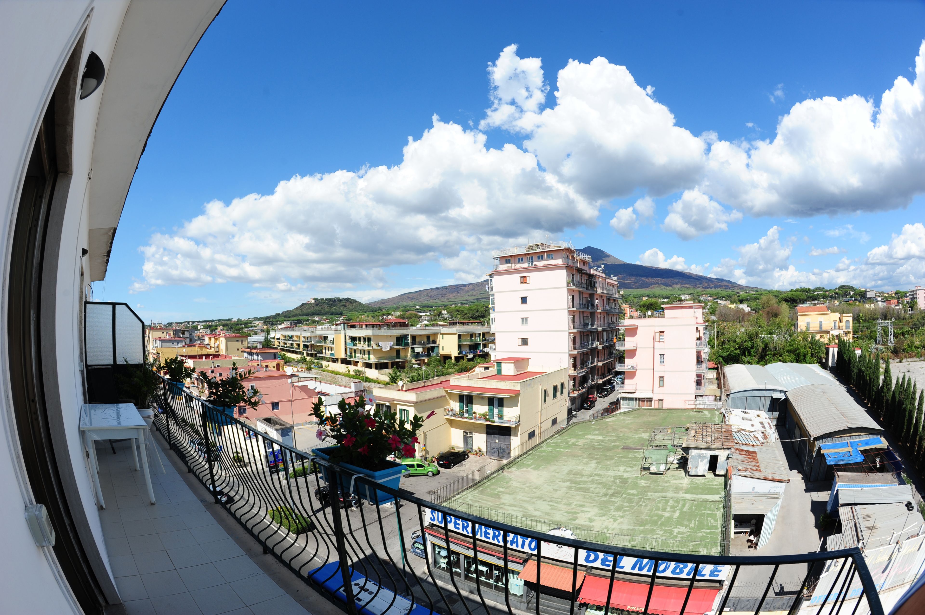 Quadruple Room, Balcony, Mountainside | City view