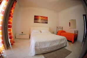 Quadruple Room, Balcony, Mountainside | Premium bedding, blackout curtains, iron/ironing board, free WiFi - The Last Floor (Torre del Greco)