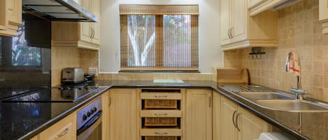 Superior Suite, 3 Bedrooms | Private kitchen | Full-size fridge, microwave, oven, stovetop