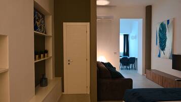 Suite Supérieure | Coin séjour | Télévision à écran plat