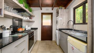 Classic Villa | Private kitchen | Fridge, electric kettle, cookware/dishes/utensils