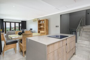 Luxury Villa, 4 Bedrooms | Private kitchen | Full-sized fridge, microwave, oven, stovetop - San Lameer Villa Rentals 14109 (Southbroom)