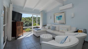 Superior Villa, 4 Bedrooms | Living area | Flat-screen TV