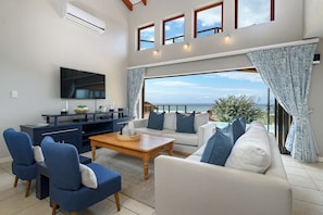 Deluxe Villa, 4 Bedrooms | Living area