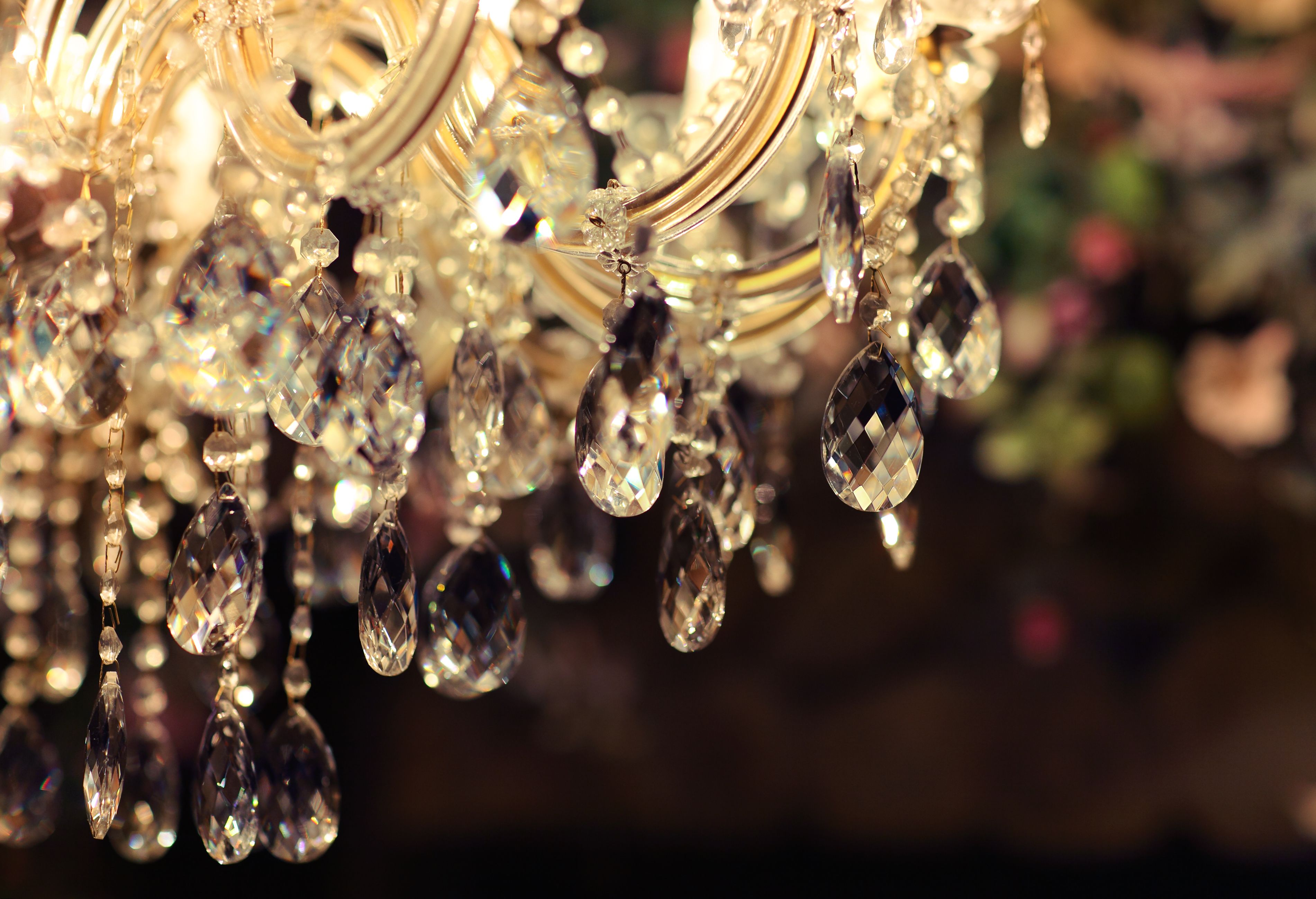 A chandelier with multiple crystal elements.
