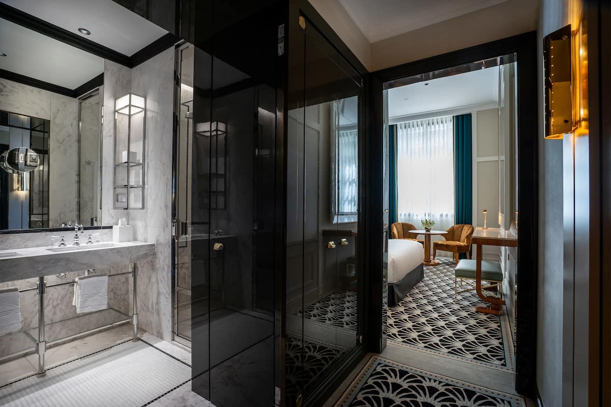 superior double or twin room | bathroom | shower, free toiletries, hair dryer, bathrobes