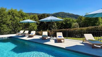 Seasonal outdoor pool, open 8:00 AM to 8:00 PM, sun loungers