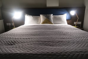 2 bedrooms, down duvets, blackout curtains, iron/ironing board