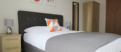 2 bedrooms, down duvets, blackout curtains, iron/ironing board