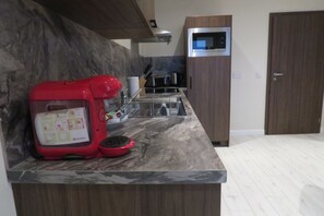 Fogão, cooktop, lava-louças, chaleira elétrica