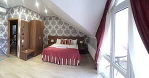 Habitación familiar | Caja de seguridad en la habitación, cortinas blackout y insonorización 