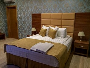 Standard Quadruple Room | In-room safe, blackout curtains, soundproofing, iron/ironing board - Guest House Kallisto (Sochi)