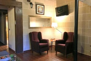 House, 4 Bedrooms | Living area | Flat-screen TV