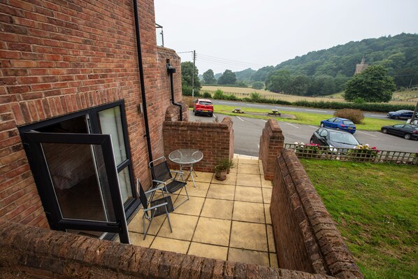Deluxe Quadruple Room, 1 Bedroom | Terrace/patio - The Windmill Inn (Taunton)