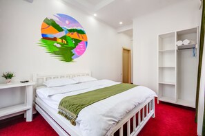 Habitación Deluxe, 1 cama Queen size, para no fumadores | Cortinas blackout, insonorización y tabla de planchar con plancha 