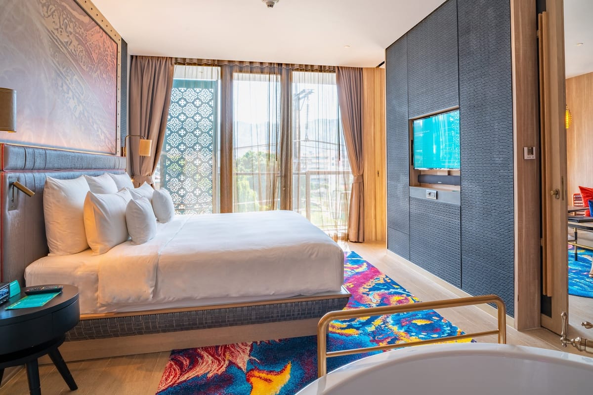 Suite, 1 Bedroom, City View | 1 bedroom, premium bedding, free minibar items, in-room safe