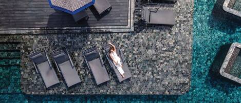 Outdoor pool, open 7:00 AM to 9:00 PM, pool umbrellas, sun loungers