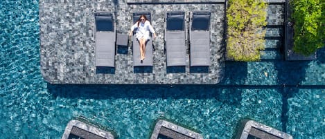 Outdoor pool, open 7:00 AM to 9:00 PM, pool umbrellas, pool loungers