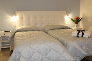 Zweibettzimmer (Selvaggio) | Minibar, Schreibtisch, kostenloses WLAN, Bettwäsche