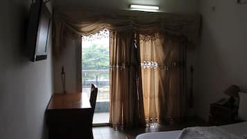 Habitación superior | Cortinas opacas, wifi gratis, ropa de cama