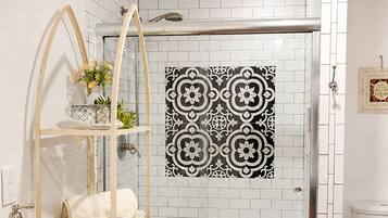 Shower, hair dryer, towels, soap