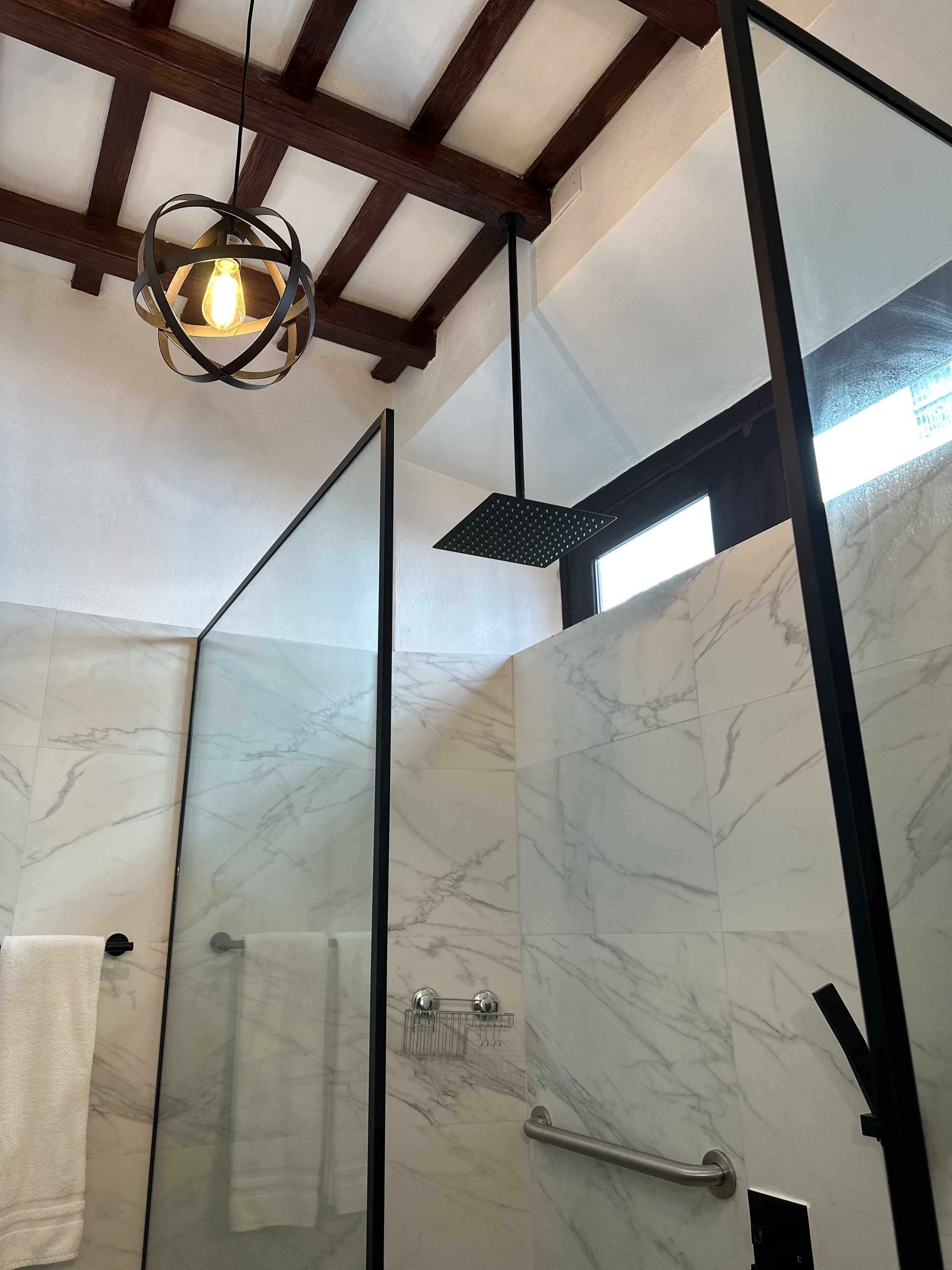 deluxe room, 1 queen bed, ground floor | bathroom | shower, hair dryer, towels, soap