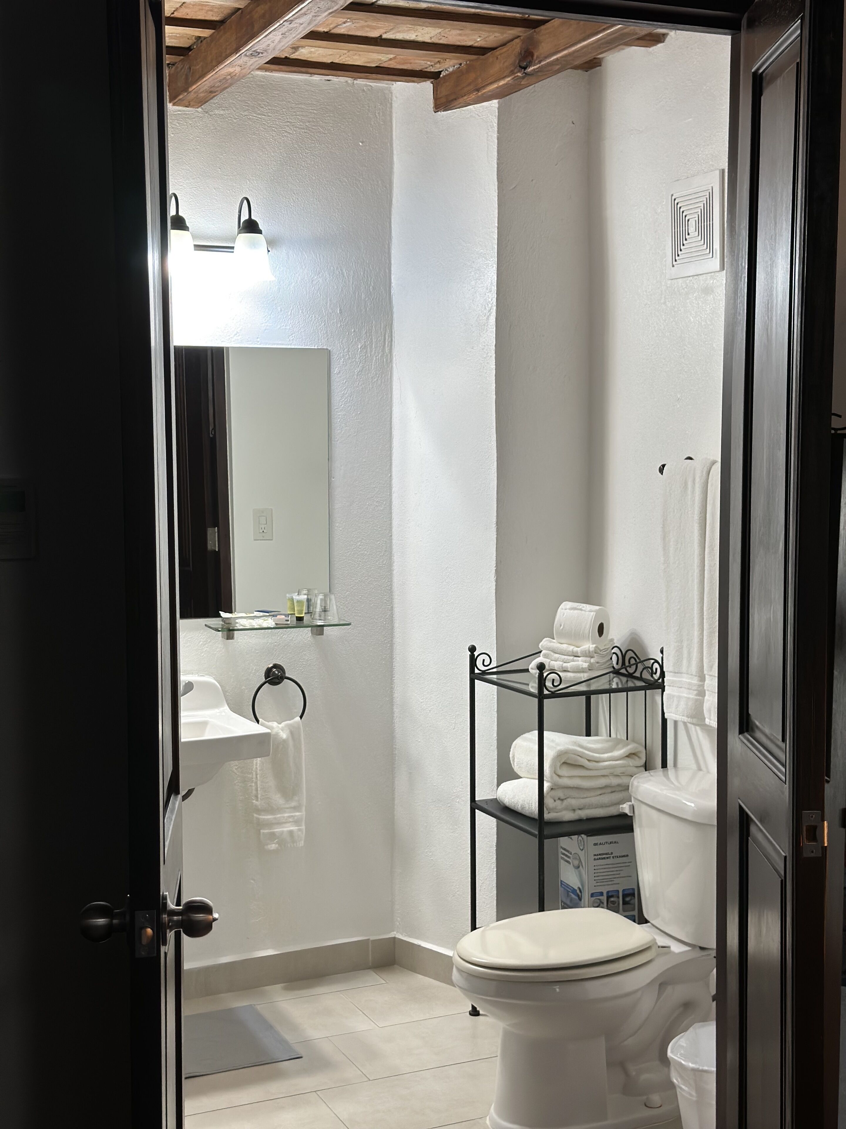 standard room, 1 queen bed | bathroom | shower, hair dryer, towels, soap