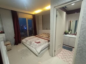 Family Apartment, 3 Bedrooms, Patio | Individually decorated, individually furnished, desk, blackout drapes