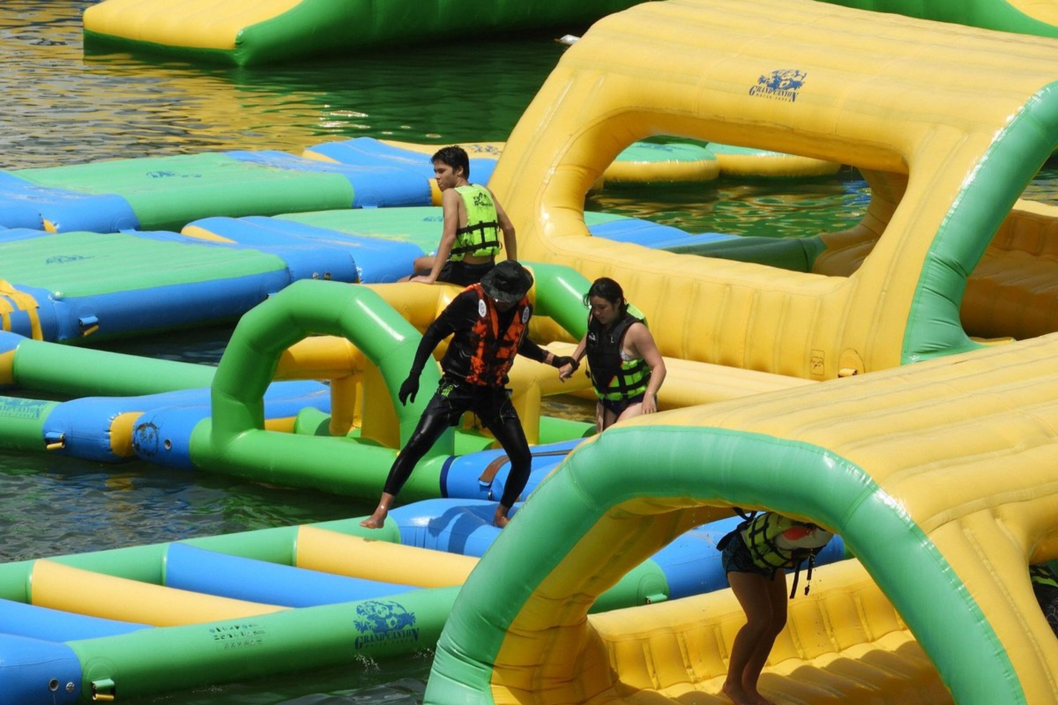 A water park with inflatable play structures.