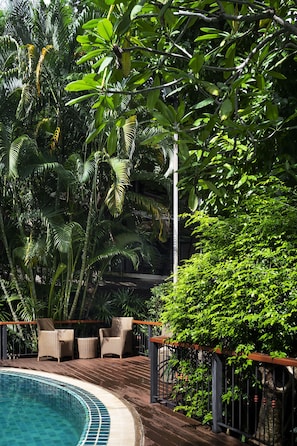 Outdoor pool, open 6:00 AM to 8:00 PM, pool loungers