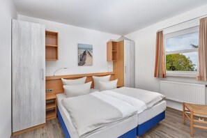 2 habitaciones, tabla de planchar con plancha, wifi y ropa de cama