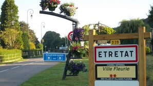 A welcome sign for Etretat, Ville Fleurie, with a blue sign indicating a pavilion and a national council sign. -  Quiet 3* Cottage 10m from Étretat | Fenced Garden | Dogs Welcome  Farm animals (Criquetot L Esneval)