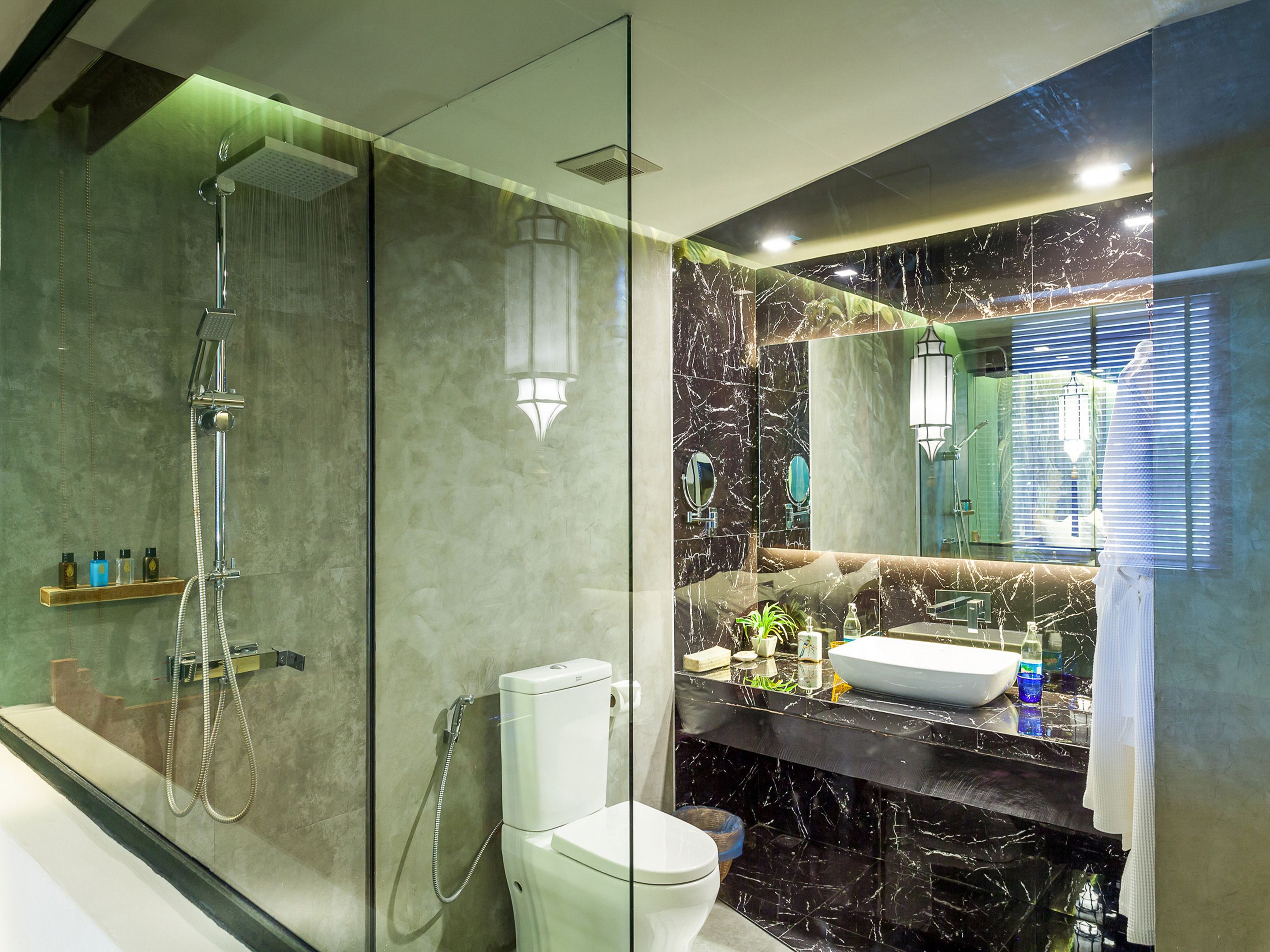 shower, free toiletries, slippers, towels