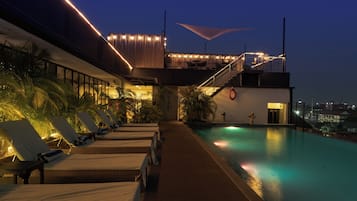 Outdoor pool, open 8 AM to 8 PM, pool loungers