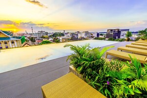 Outdoor pool, open 8 AM to 8 PM, sun loungers