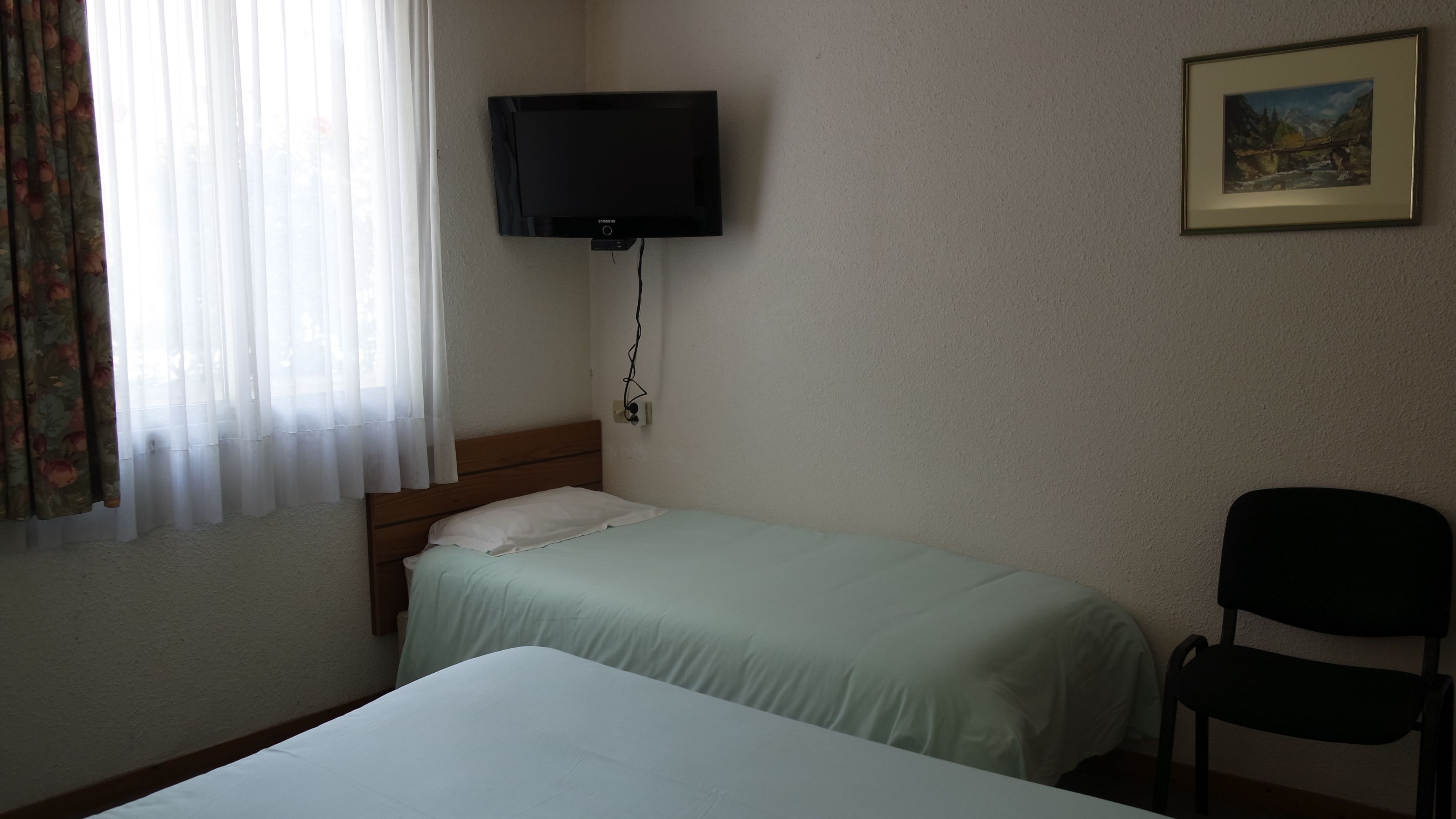 standard triple room | in-room safe, desk, blackout curtains, iron/ironing board