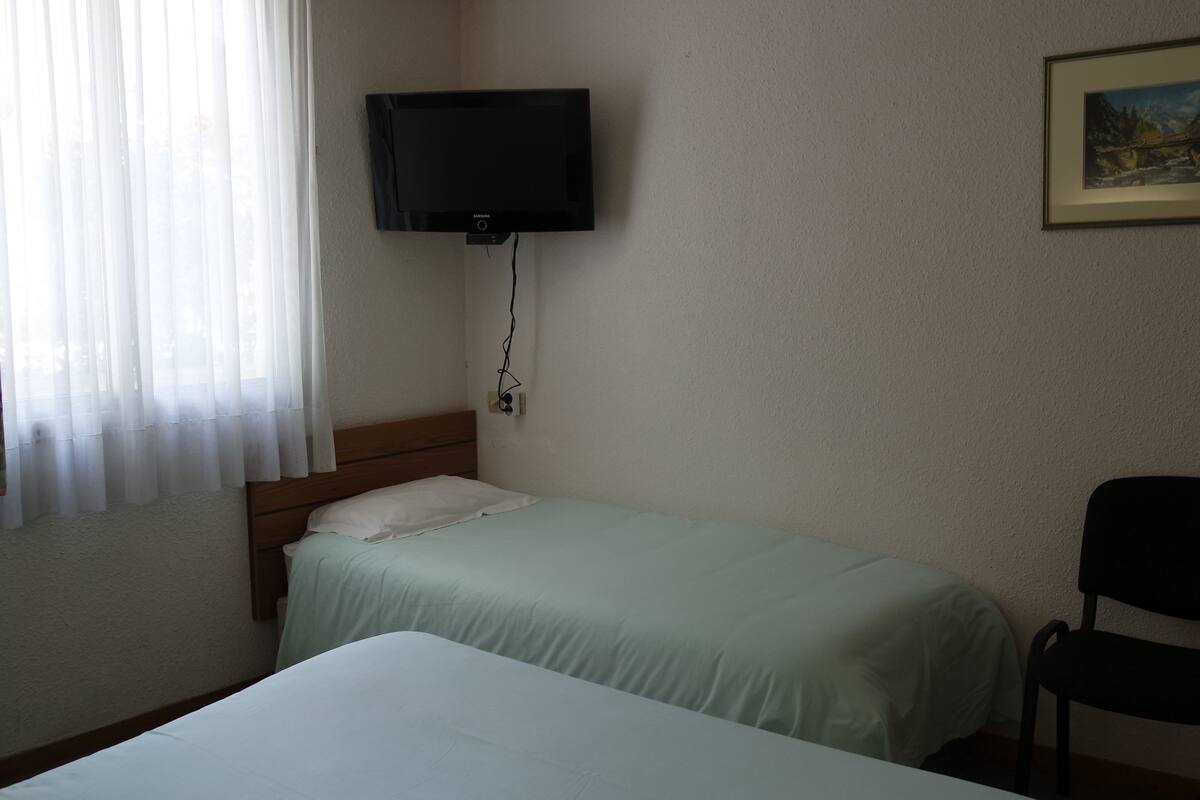 standard triple room | in-room safe, desk, blackout curtains, iron/ironing board