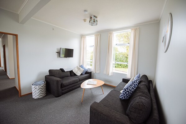 Apartment, 4 Bedrooms | Living area