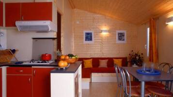 Standard Bungalow | Living area | Flat-screen TV
