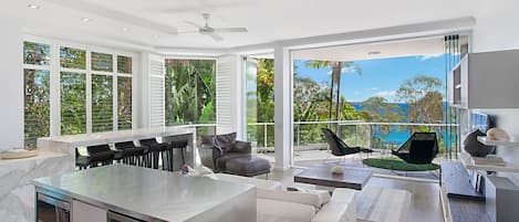 Deluxe Apartment, 2 Bedrooms, Ocean View | Living area | LCD TV, DVD player