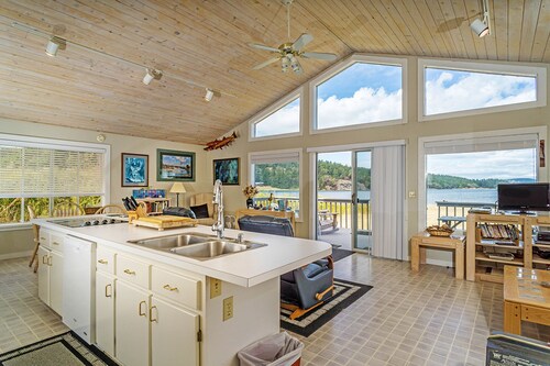 Modern waterfront home minutes from shopping, dining, & beaches