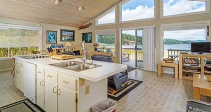 Modern waterfront home minutes from shopping, dining, & beaches