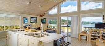 Modern waterfront home minutes from shopping, dining, & beaches