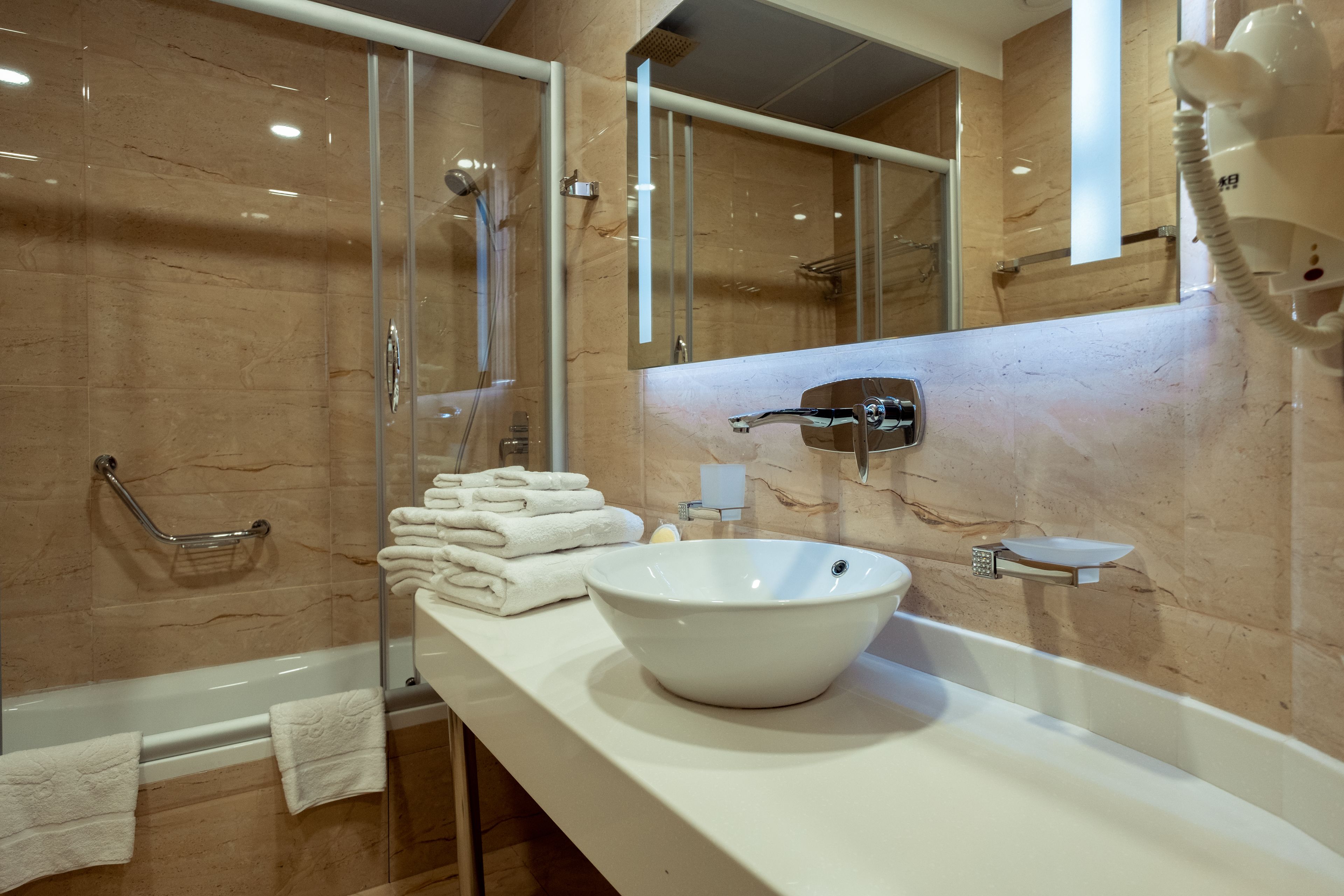 free toiletries, hair dryer, bathrobes, slippers