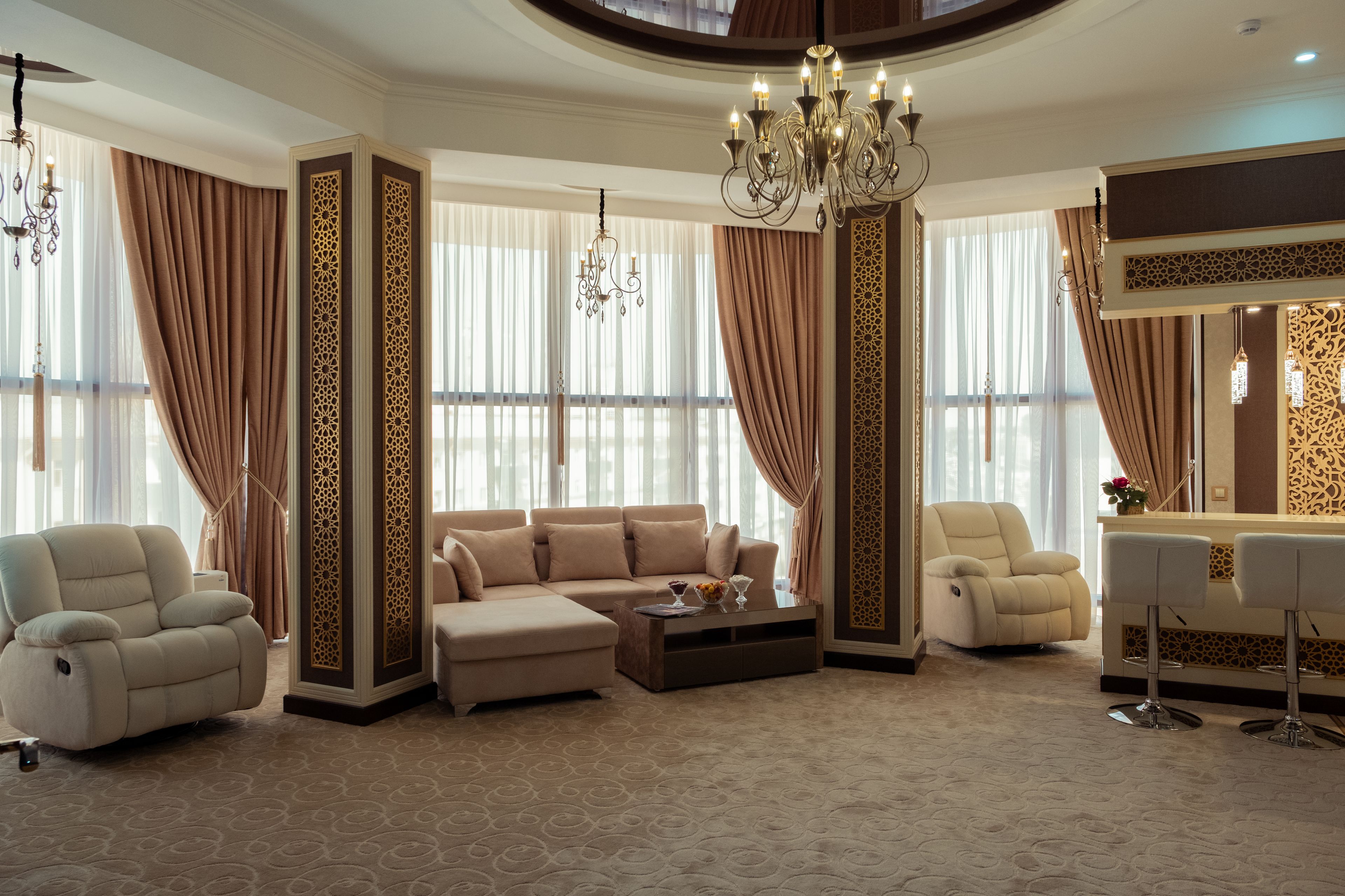 deluxe double room, jetted tub | living area | flat-screen tv, heated floors